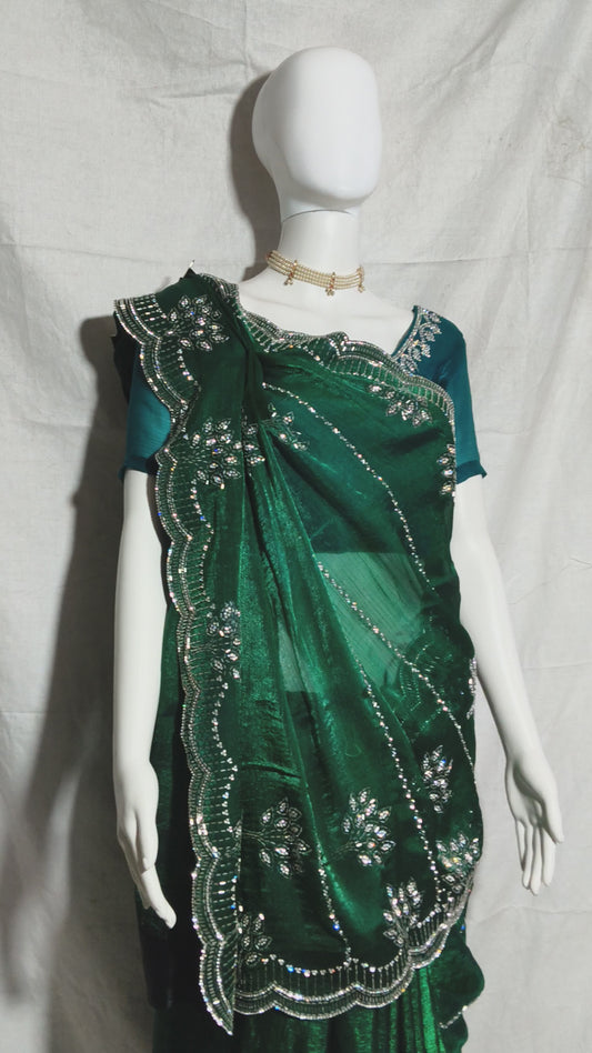 Party wear saree with zarkan and stone embellishments